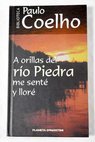 A orillas del ro Piedra me sent y llor / Paulo Coelho