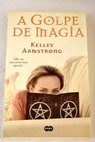 A golpe de magia / Kelley Armstrong