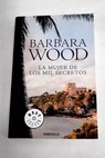 La mujer de los mil secretos / Barbara Wood