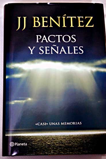 Pactos y seales casi unas memorias / J J Bentez